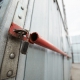 A close up of an unlocked cargo-crate at a create yard