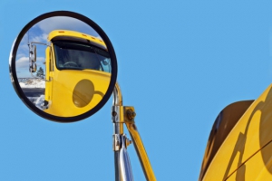 Semi Truck Side View Mirror With Reflection Of Cab